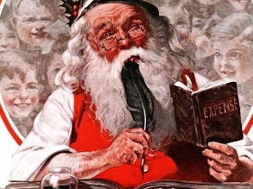 Santa writing in a book, quill in hand