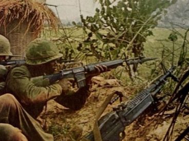 Soldiers fighting in Vietnam jungle