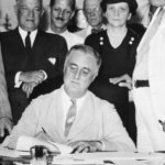 FDR signing a bill