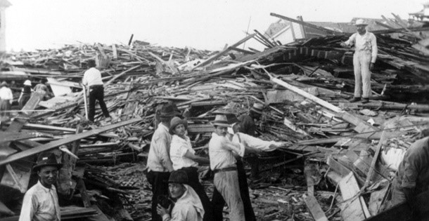 Relief workers among the wreckage following a hurricane in Galveston, Texas