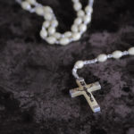 A rosary on a table