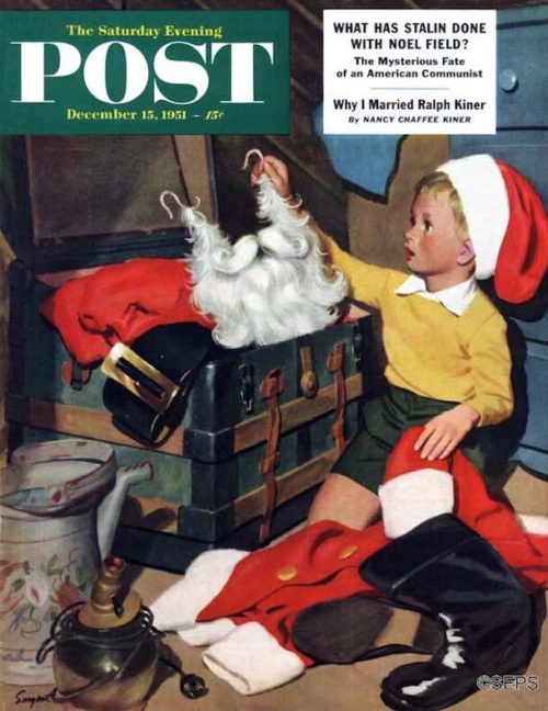 Boy pulling Santa's head out of a large, antique trunk