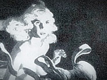 Woman Taking off her Dress
