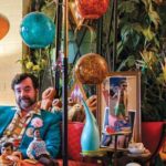 Man surrounded by stuff