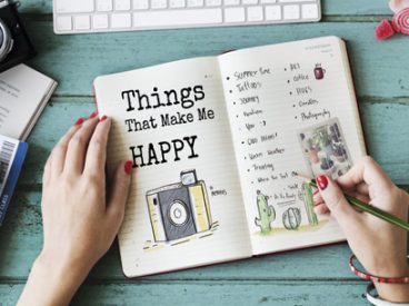 Woman writing in journal
