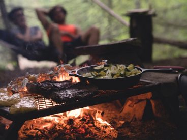 Food cooking on a campfire.