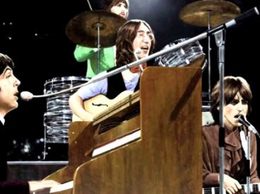 The Beatles in mid-performance
