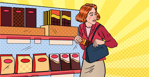 Woman shoplifting chocolate from a supermarket store