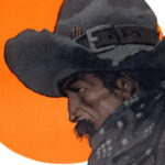 Profile view of a cowboy. The sun sets over a mountain range behind him.