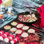 Collection of food items on a barbeque grill