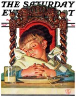 Boy asleep at table after Thanksgiving feast