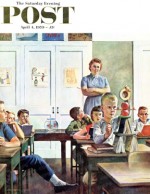 Teacher watches boy build tower with school supplies