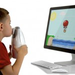 Aerocrine NIOX MINO- boy using device with computer image