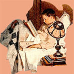 Boy Reading in bed.