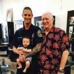 Chris Trokey and son Porter pose with Dr. Michael Shannon