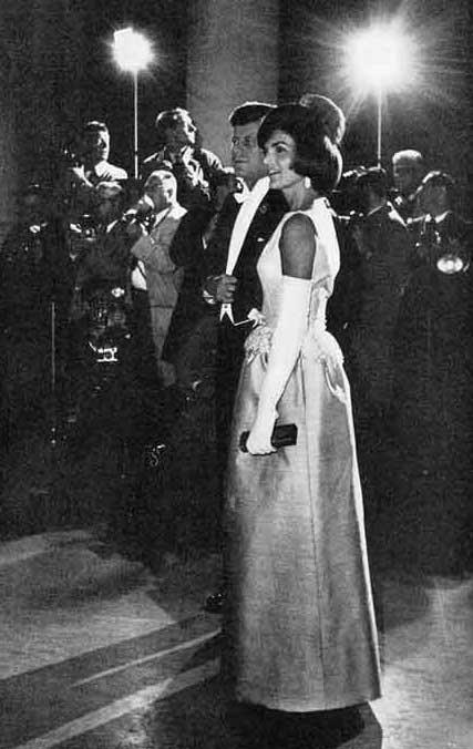 President John F. Kennedy and wife Jacqueline Kennedy at a White House soiree. © SEPS 2013