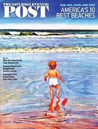 baby on beach pulling toy boat