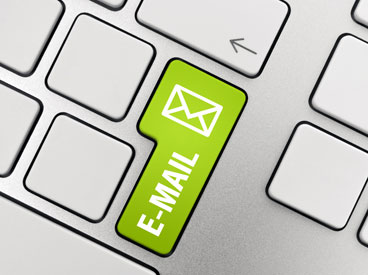 Keyboard with a green key and the word e-mail