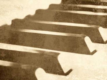 close up of vintage piano keys. Source: Shutterstock.com/ Ensuper