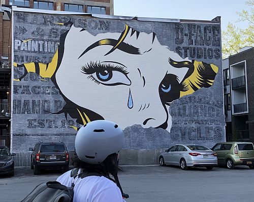 A mural of a woman's face.