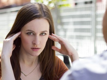 Young woman annoyed with her date. Source: Shutterstock.com / © Rommel Canlas