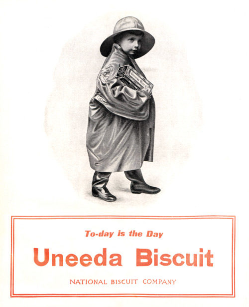 Ad for Unneda Biscuit. Boy in a raincoat.