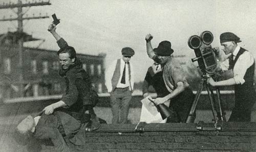 Desperate Times: Disney started a production company in Kansas City to produce short features. To save money, he provided some of the acting talent (that's him holding the gun).