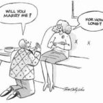 A man proposes to his girlfriend.