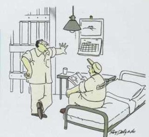 Two men in a jail cell.