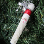 Clothespin Santa Ornament hanging in Christmas tree