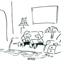 Two kids talk on a couch.