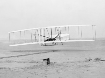 Orville and Wilbur fly the Wright Flyer
