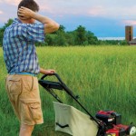 A man mowing his lawn