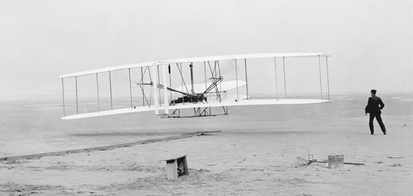 Orville and Wilbur fly the Wright Flyer