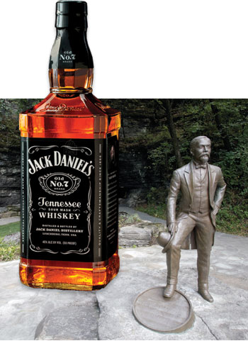 Statue of Jack Daniel and a bottle of his whiskey