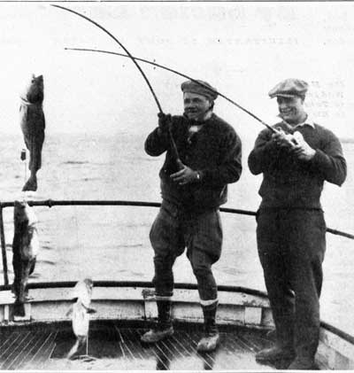Babe Ruth and Lou Gehrig enjoy a fishing trip. Wide World Photos.