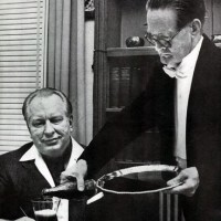 L. Ron Hubbard watching his butler pour a drink.