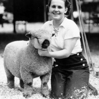 photo_4_h_club_shropshire Mildred Harper and her prize lamb at the 1937 Shopshire 4-H Club ShowCourtesy: Iowa State Fair/Des Moines