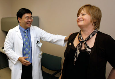 Vaccine Renews Hope Dr. Patrick Hwu meets with Hilde Stapleton, who credits the trial vaccine plus interleukin-2 with knocking her melanoma into remission. In May 1999, Stapleton found a suspicious mole behind her left knee. After surgery to remove the mole and lymph nodes (the cancer had spread) at M.D. Anderson, she enrolled in an early cancer vaccine study. But by 2006, the melanoma had returned. Because the cancer had metastasized to her lungs, her earlier experience in a vaccine trial led her to volunteer for Hwu's trial the following spring. She has been in full remission ever since. "I'm, pleased with the results," she says. Image: © AP Photo/David J. Phillip.