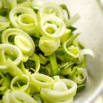 Washed and Sliced Leeks in Sieve