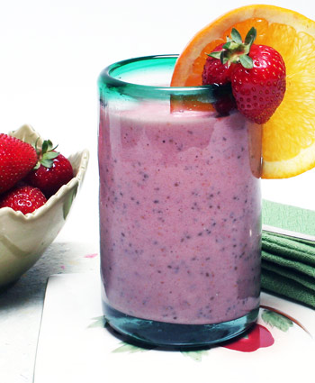 bowl of strawberries and strawberry chia smoothie