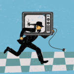 Man carrying a broken television