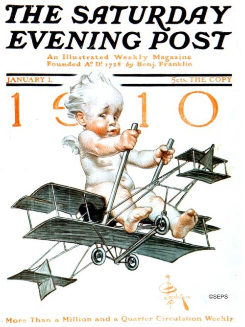Baby flying a biplane