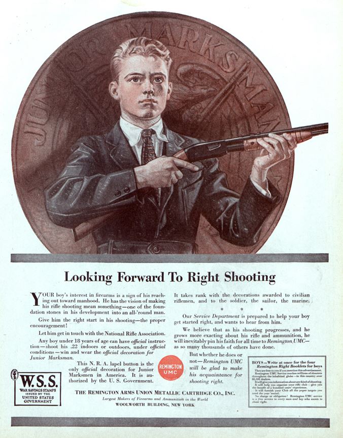 A teenage boy holding a rifle.