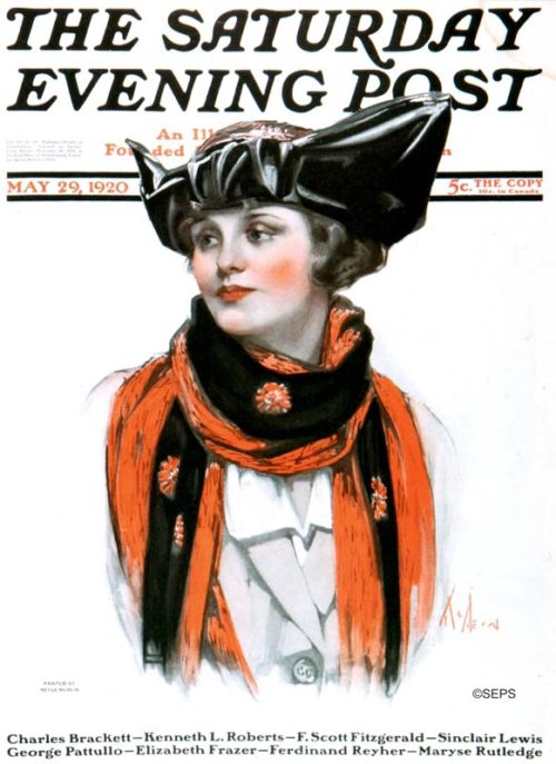 Woman wearing black hat and a scarf