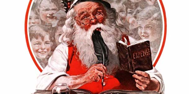 Santa writing in a book, quill in hand