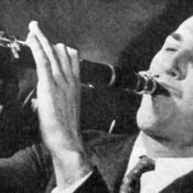 Artie Shaw playing a clarinet
