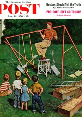 Father struggling to erect swing set