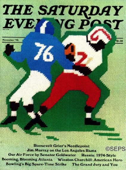 Two football players in mid-tackle, done in needlepoint.