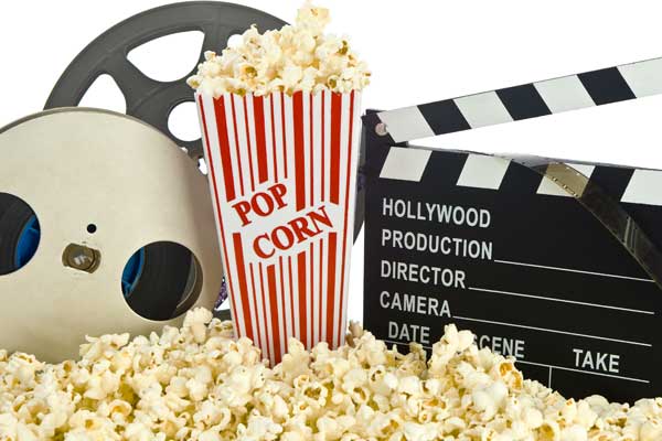 popcorn, film reel, and movie clapboard